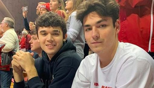 Anthony Leal and Trey Galloway watch an Indiana game together at Assembly Hall.